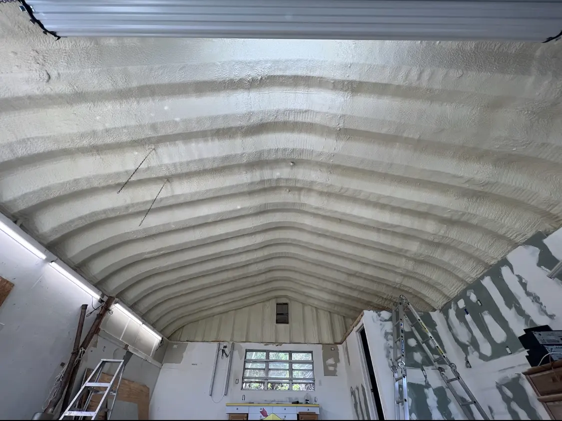Spray polyurethane foam applied to the underside of a metal roof deck in Wylie